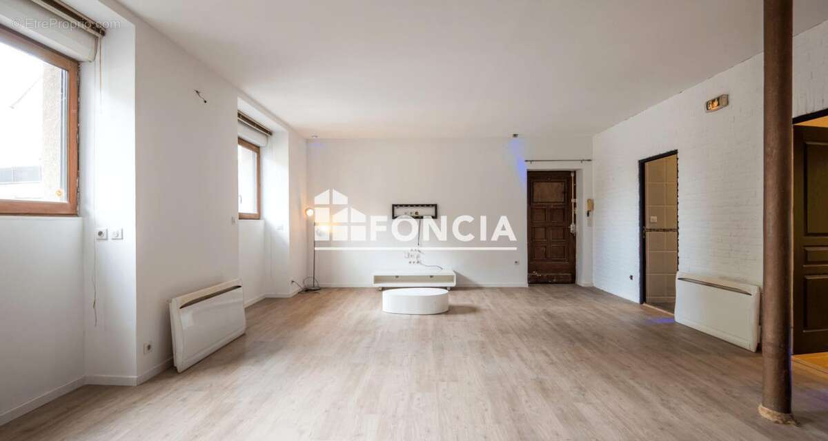 Esprit loft pour ce 3 pièces quartier Faubourg - photo 9
