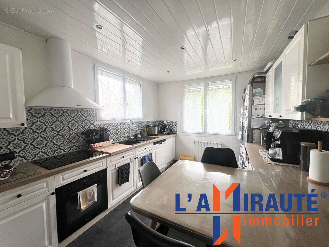 Maison à SARTROUVILLE