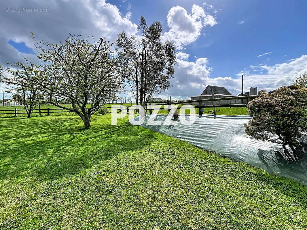 A VENDRE à Grandparigny - Maison 6 pièce(s) 196 m² - photo 15