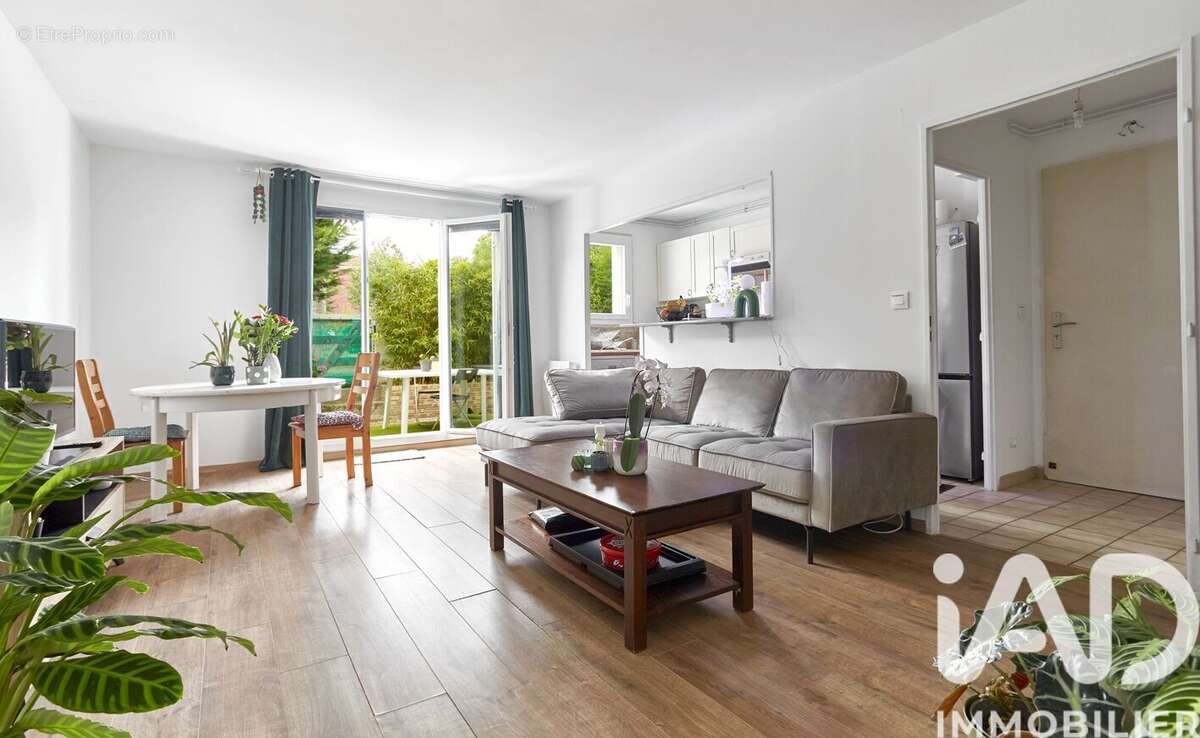 Photo 5 - Appartement à VOISINS-LE-BRETONNEUX