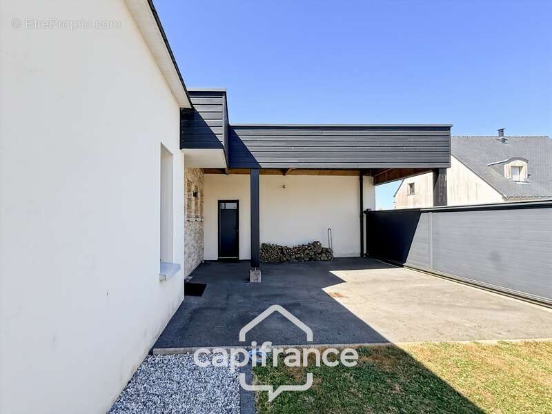 Maison contemporaine de plain-pied de 160 m² – 4 chambres – Véranda de 27 m² avec spa – Double garage – Carport – Noyal-Pontivy - photo 28