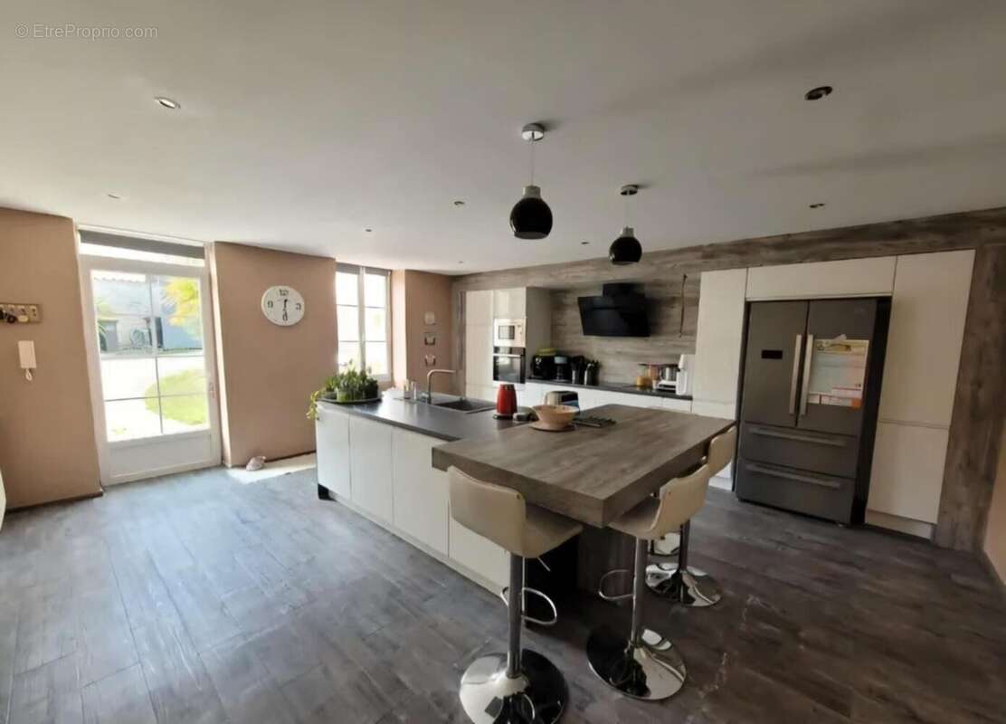 Photo 2 - Maison à ASNIERES-SUR-NOUERE