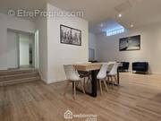 Découvrez ce superbe appartement type loft de 128 m², situé rue Marlot à Reims, Un bien rare mêlant volumes généreux et confort en hyper centre. - Appartement à REIMS