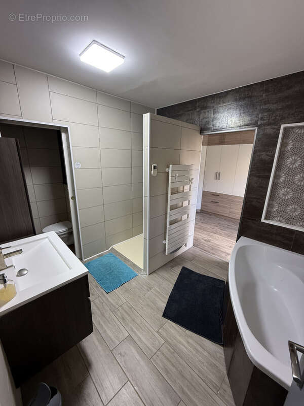 Maison d'architecte de 300m2 sur un terrain de 5.79 ares avec jardin et garage - photo 8