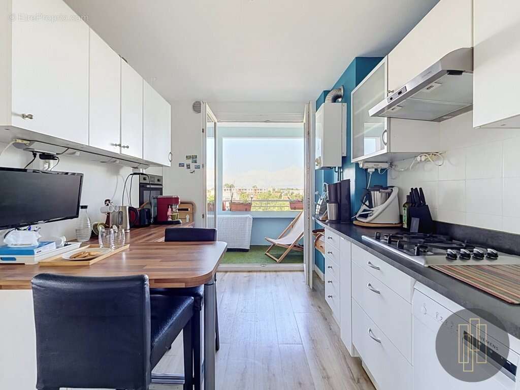 Exclusivité - Appartement 68.8 m², séjour double - 2 chambres - balcon cave et ascenseur - photo 2