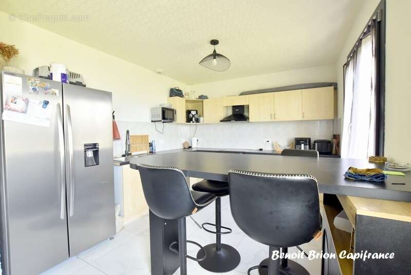 Maison de plain-pied 4 chambres - photo 7