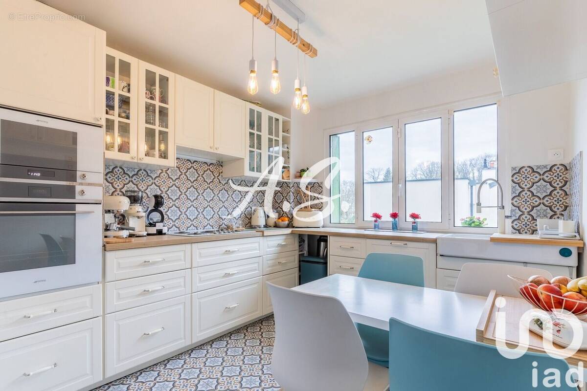 Photo 1 - Maison à VERRIERES-LE-BUISSON