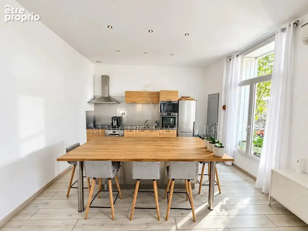 T4 de 89m² avec ascenseur et parking - photo 2