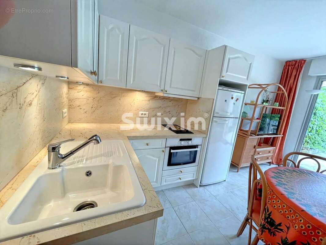 Studio cabine en rez de jardin + parking + cave - photo 7