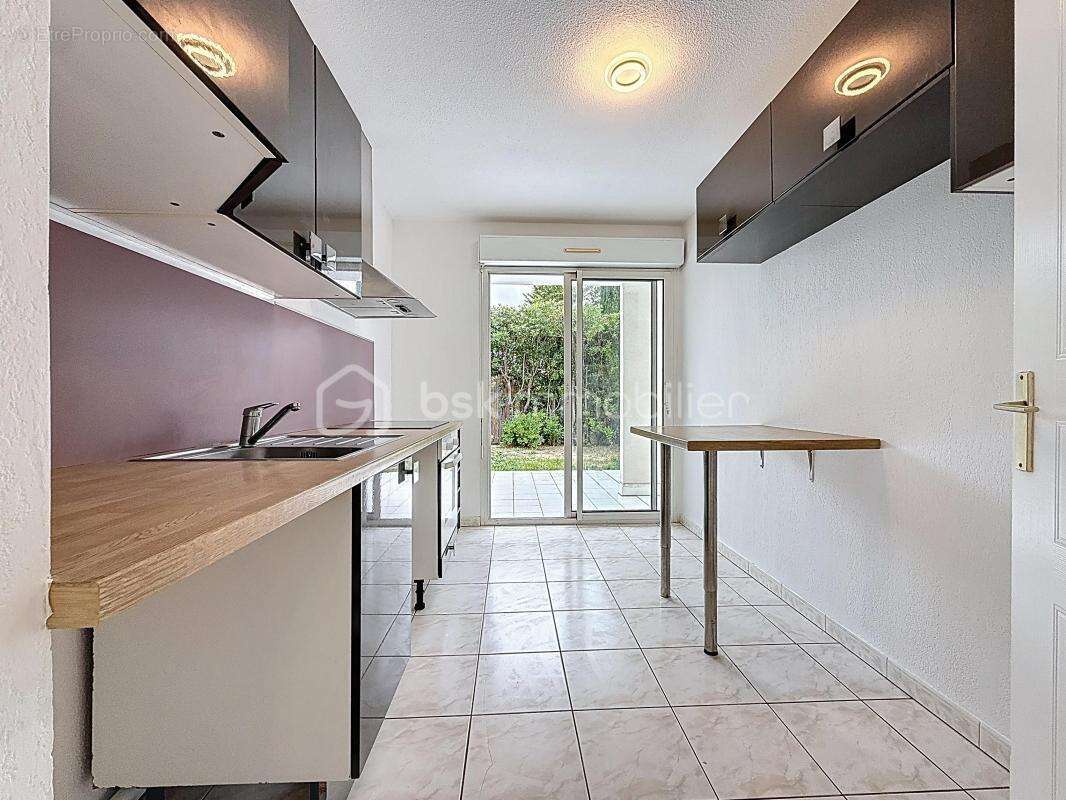 Appartement 2 pièces de 59 m2 avec jardin de 130 m2 + parking et cave - photo 15