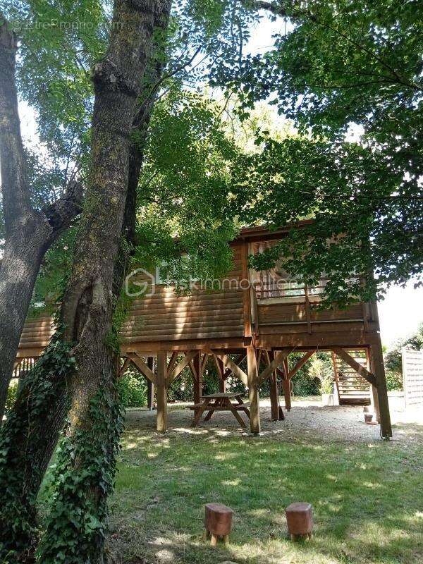 Chalet en vente - Vivez le charme discret dans un cadre paisible - photo 2