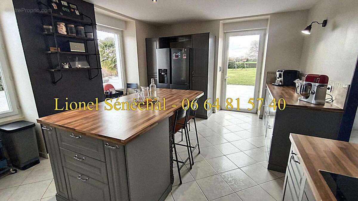 Maison à SAVIGNE-L'EVEQUE