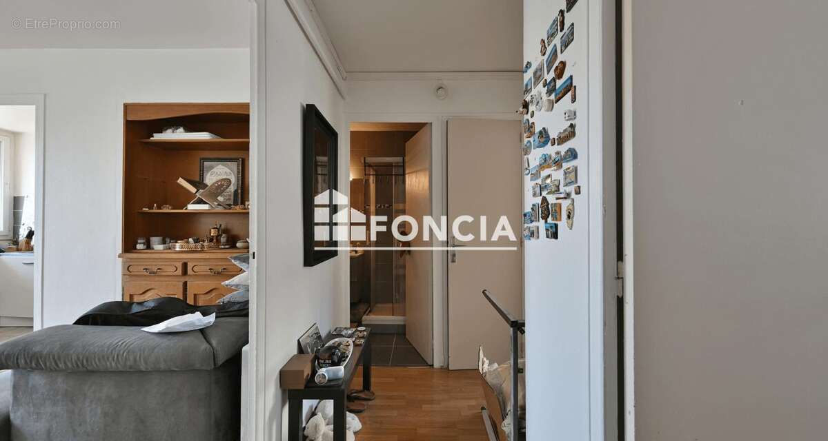 À vendre – Appartement T2 traversant de 52 m² avec terrasse, garage, cave et locataire en place - photo 5