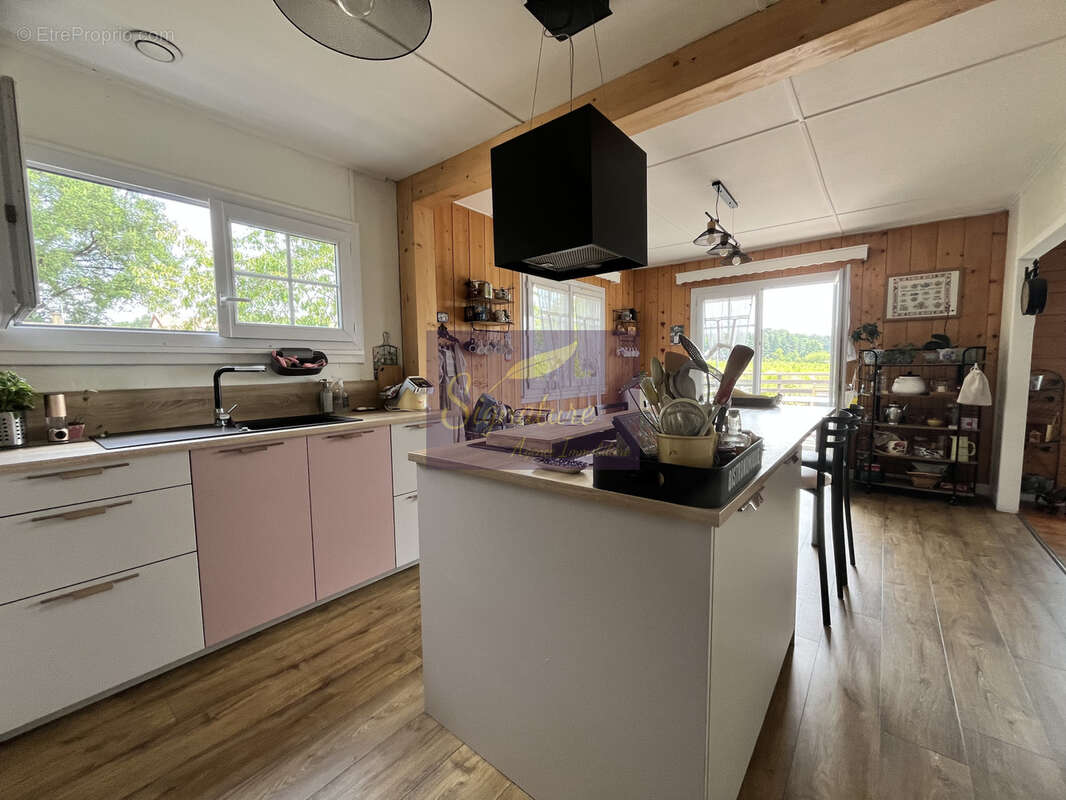 Maison familiale en ossature bois de 145 m2, quatre chambres.  Terrain de 1824 m2 garage double. - photo 8