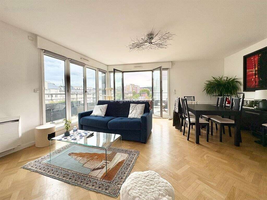 Issy - quai de seine / appartement familial / terrasse / vue degagee / cave / parking / - photo 3