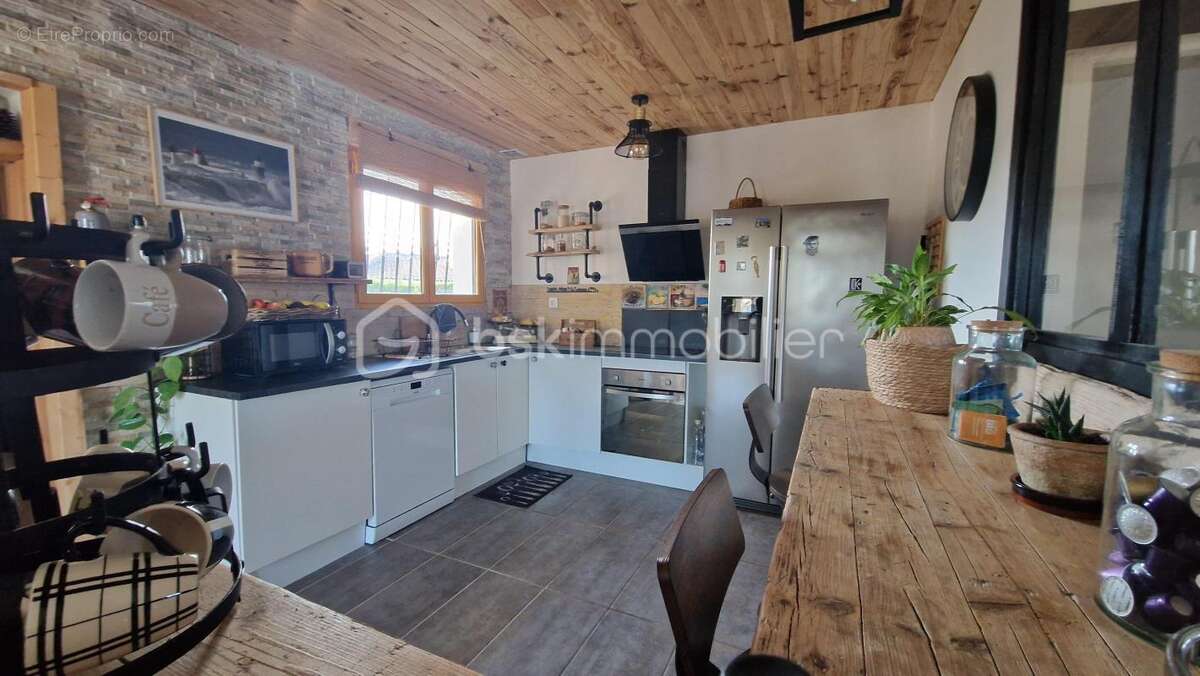 Maison de plain-pied avec beau terrain piscinable - photo 4