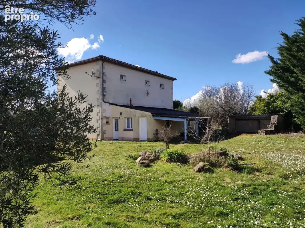 Propriété familiale avec potentiel - photo 2