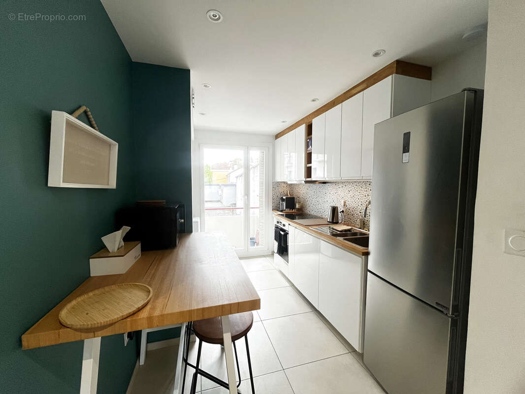 HIDRI IMMO PLUS vous propose un T4 rénové lumineux et climatisé coup de coeur assuré à Grenoble - photo 3