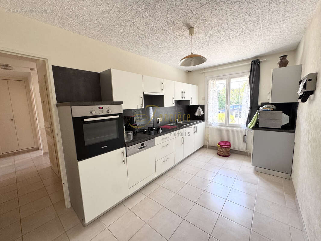 Maison de plain-pied avec sous-sol quartier Gionne avec agréable jardin - photo 3