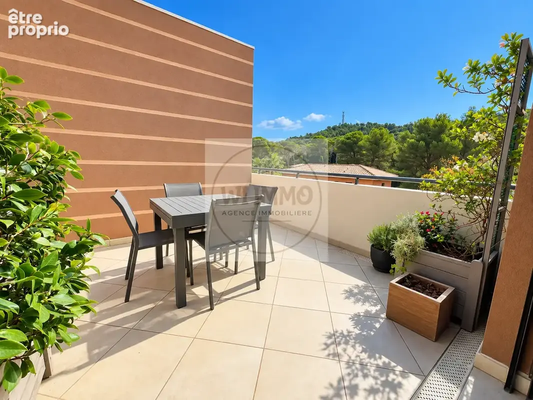 Appartement T3 avec terrasse et garage - photo 3