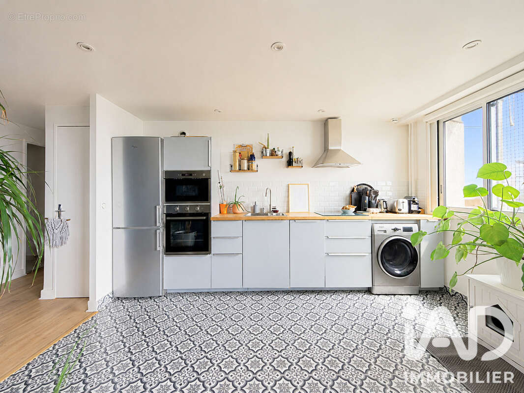 Photo 8 - Appartement à COURBEVOIE