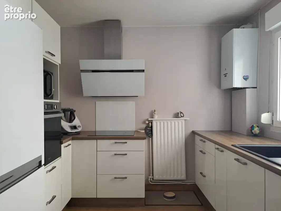 Appartement T4 en duplex de 85m2 avec jardin et terrasse dans le centre de Fontaines St Martin ! - photo 5