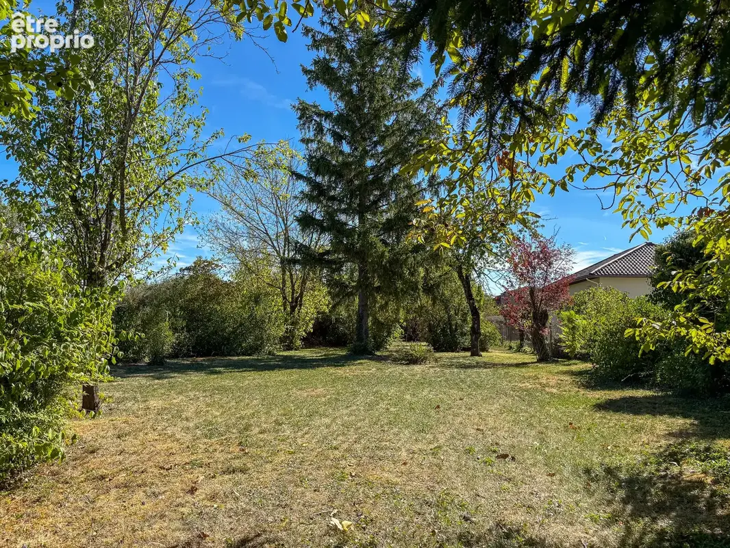 Maison familliale de 168m2 sur 1550m2 de terrain arboré - photo 3