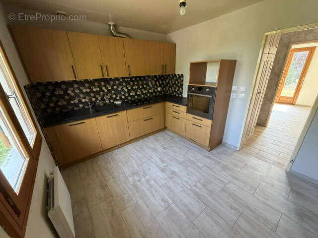 Maison de plain-pied avec garage sur terrain de 900 M2 - photo 6