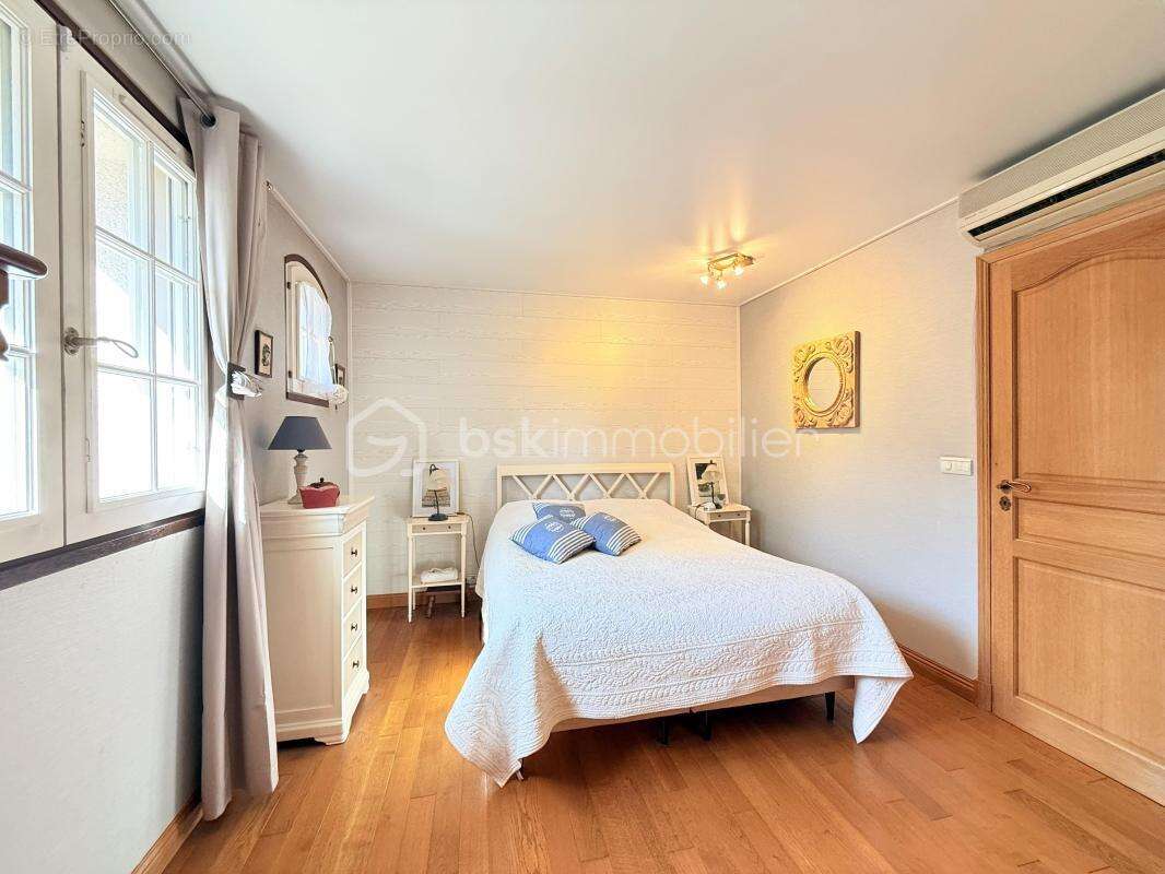 Maison spacieuse avec terrasse et jardin dans un cadre serein - photo 11