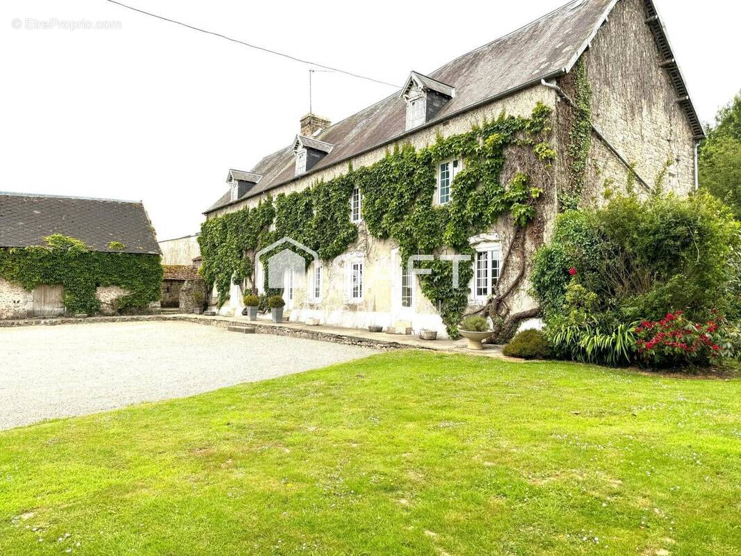 Photo 1 - Maison à DOVILLE