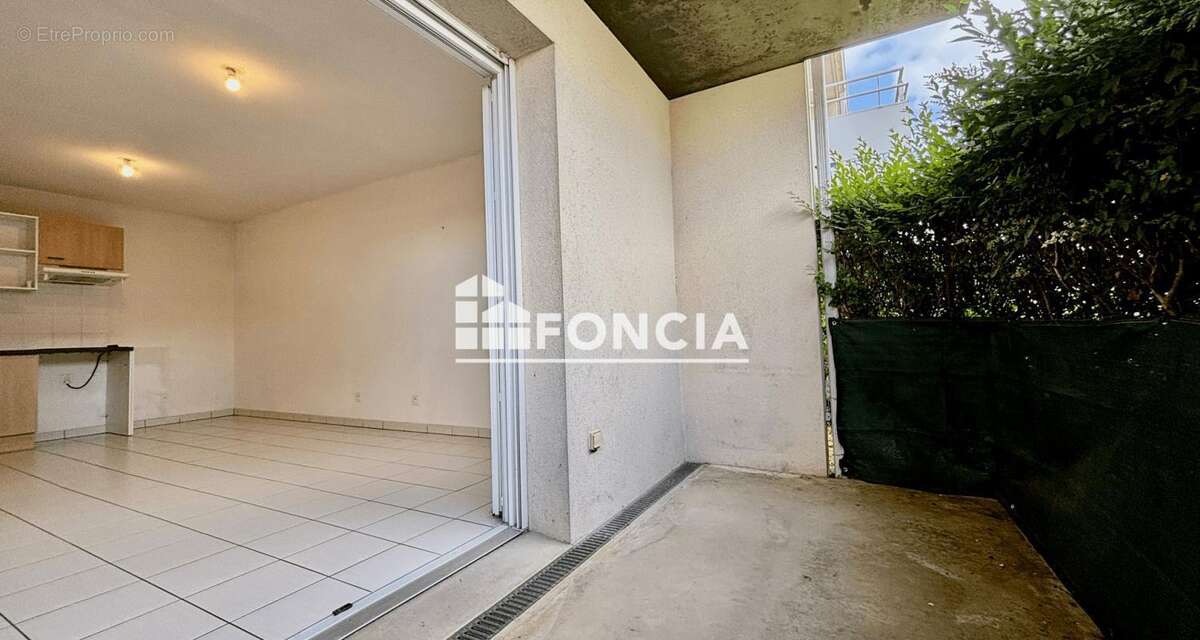 Bourg, appartement type 3 stationnements - photo 9
