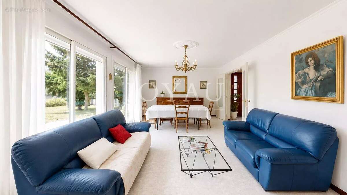 Maison familiale de 115 m² avec jardin, garage et fort potentiel - L'Union - photo 4