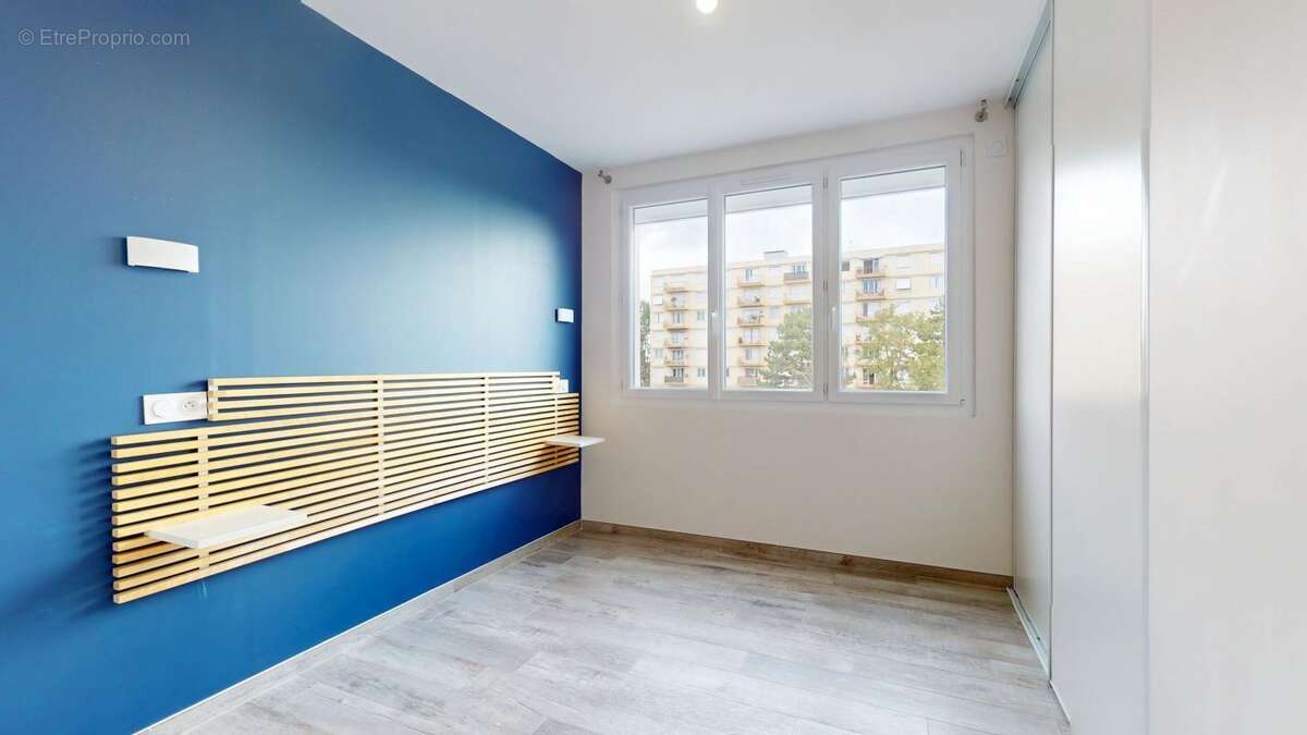 Appartement T4 rénové avec balcon – Résidence calme et sécurisée - photo 8