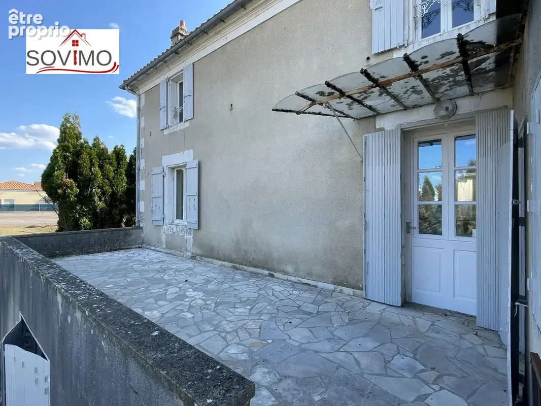 Maison de ville à rénover : jardin, garage et beau potentiel - photo 20