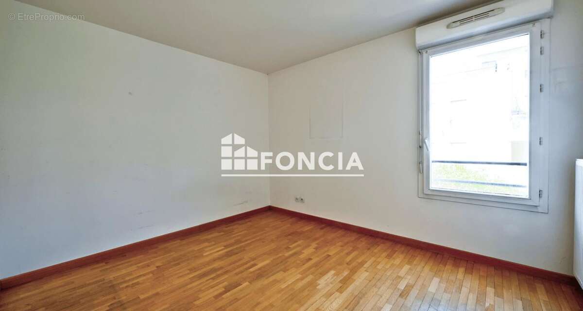 Appartement familial de 4 pièces (3 chambres) avec une place de parking, proche des écoles, des commerces et des transports - photo 8