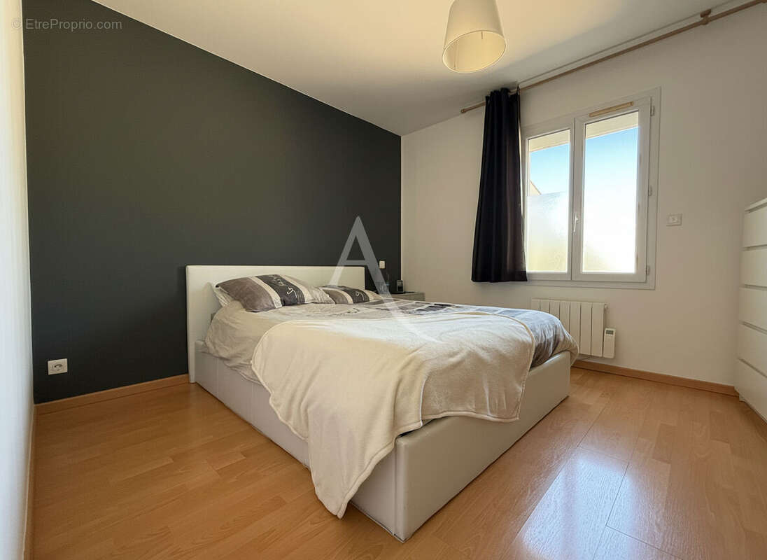 PUILBOREAU  Maison de 142 m² - photo 11