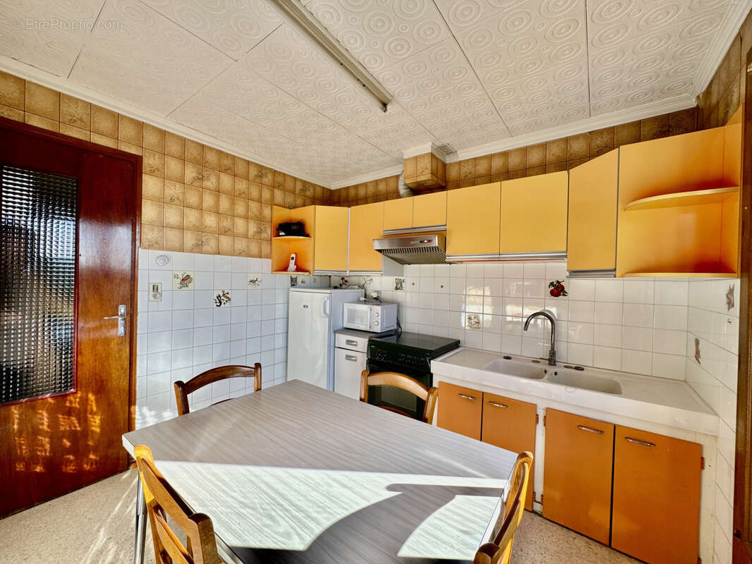 Maison à LAUDUN-L'ARDOISE