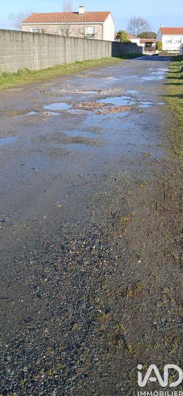 Photo 5 - Terrain à LES LANDES-GENUSSON