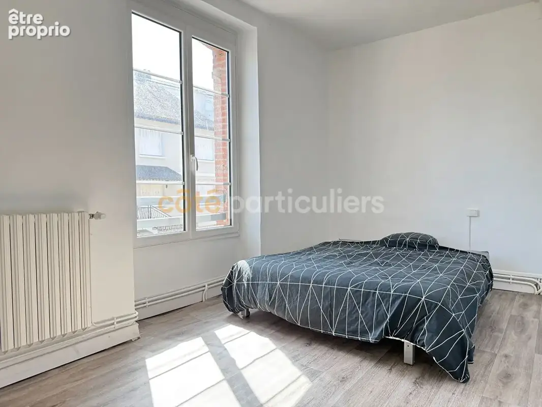 A VENDRE- LAVAL - Maison 2 Chambres - photo 7
