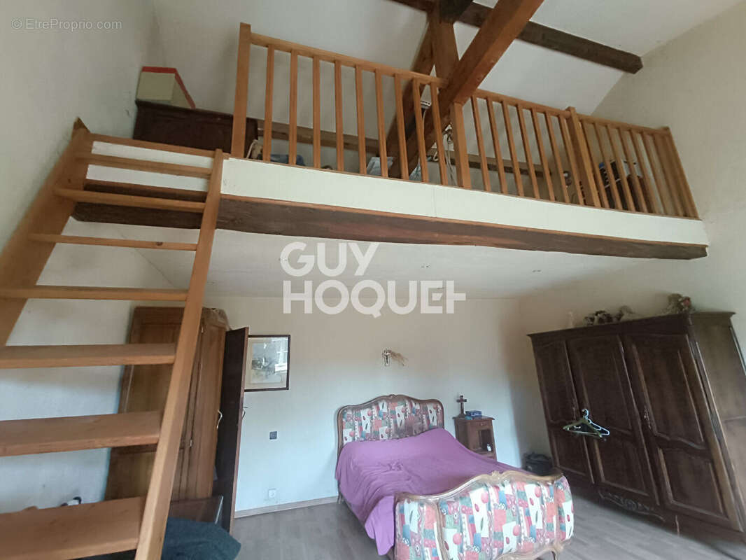 Maison à ESSERTINES-EN-DONZY