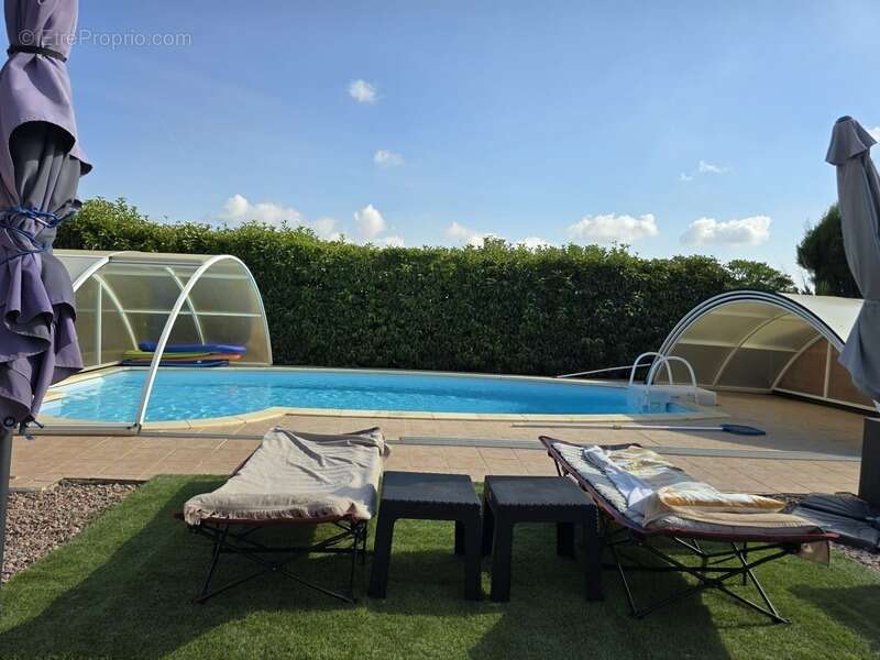 Villa familiale de plain-pied – 181 m² – 5 chambres – piscine – véranda – terrain de 916 m² - photo 16