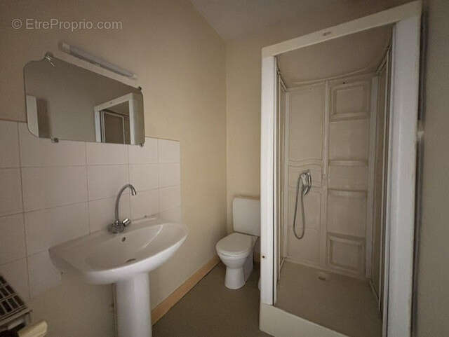 EXCLUSIVITE à AUTUN, T3 en RDC avec balcon et garage. - photo 6