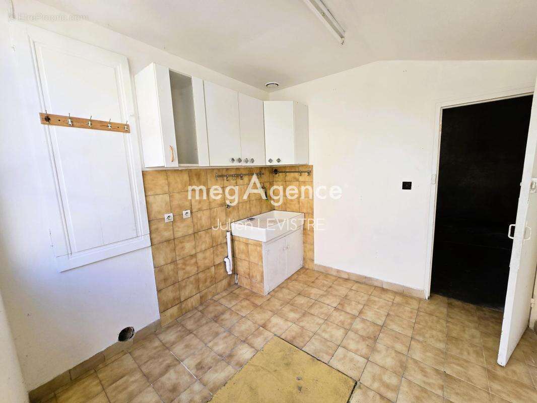 maison de 5 pièces de 122m² - photo 7
