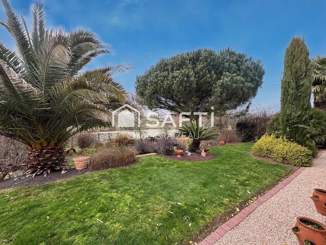 Photo 2 - Maison à LA CHAPELLE-SAINT-LAURENT