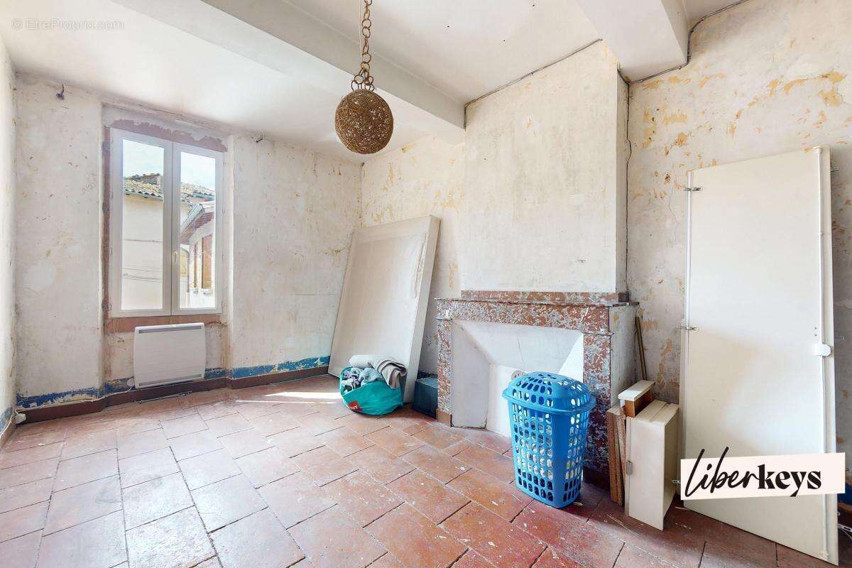 Immeuble comprenant deux habitations et un commerce - photo 6