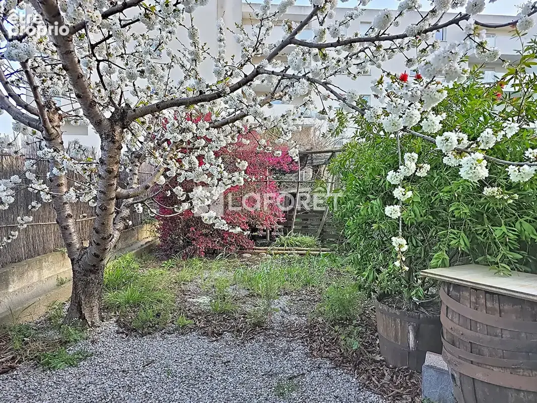 Appartement lumineux de 64 m2 avec Jardin privatif, garage, cave et balcon - photo 2