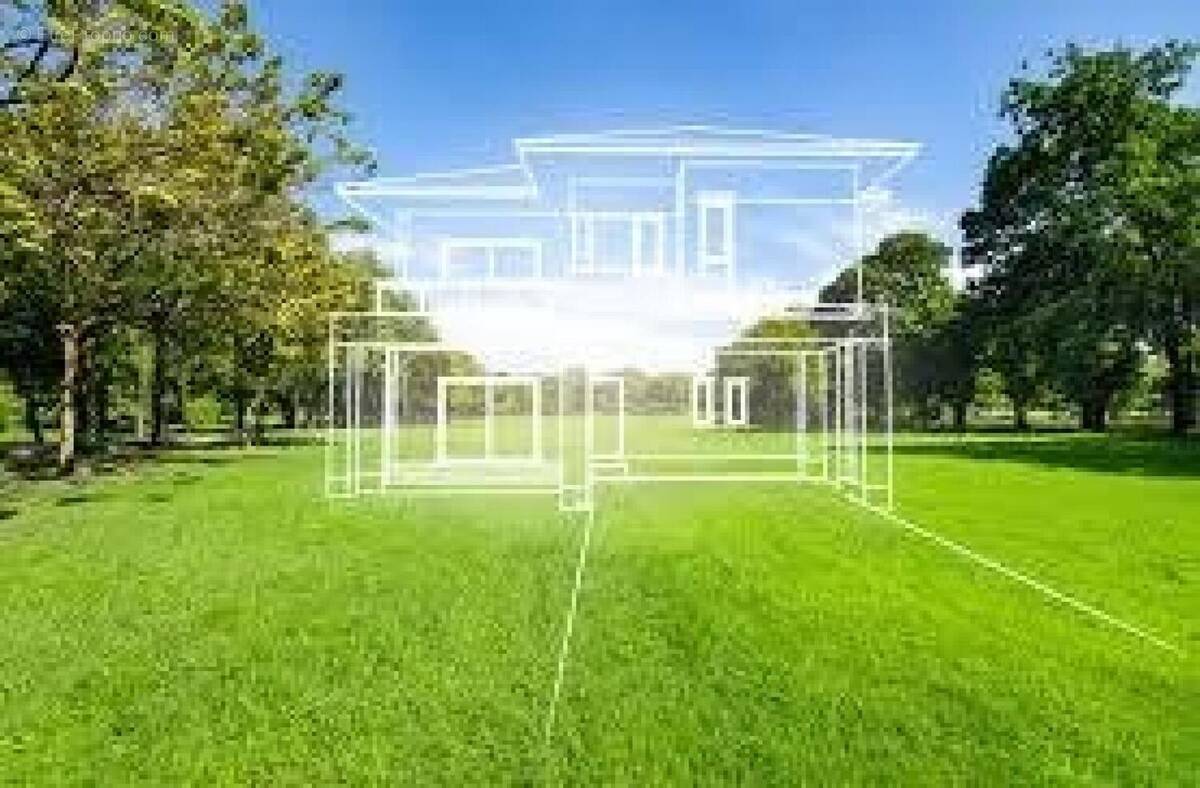 Photo 1 - Terrain à CAOUENNEC-LANVEZEAC