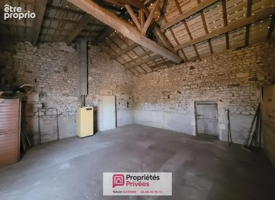 DIGNAC (16410) : Maison en pierre de 76m2 avec grange et atelier - photo 8