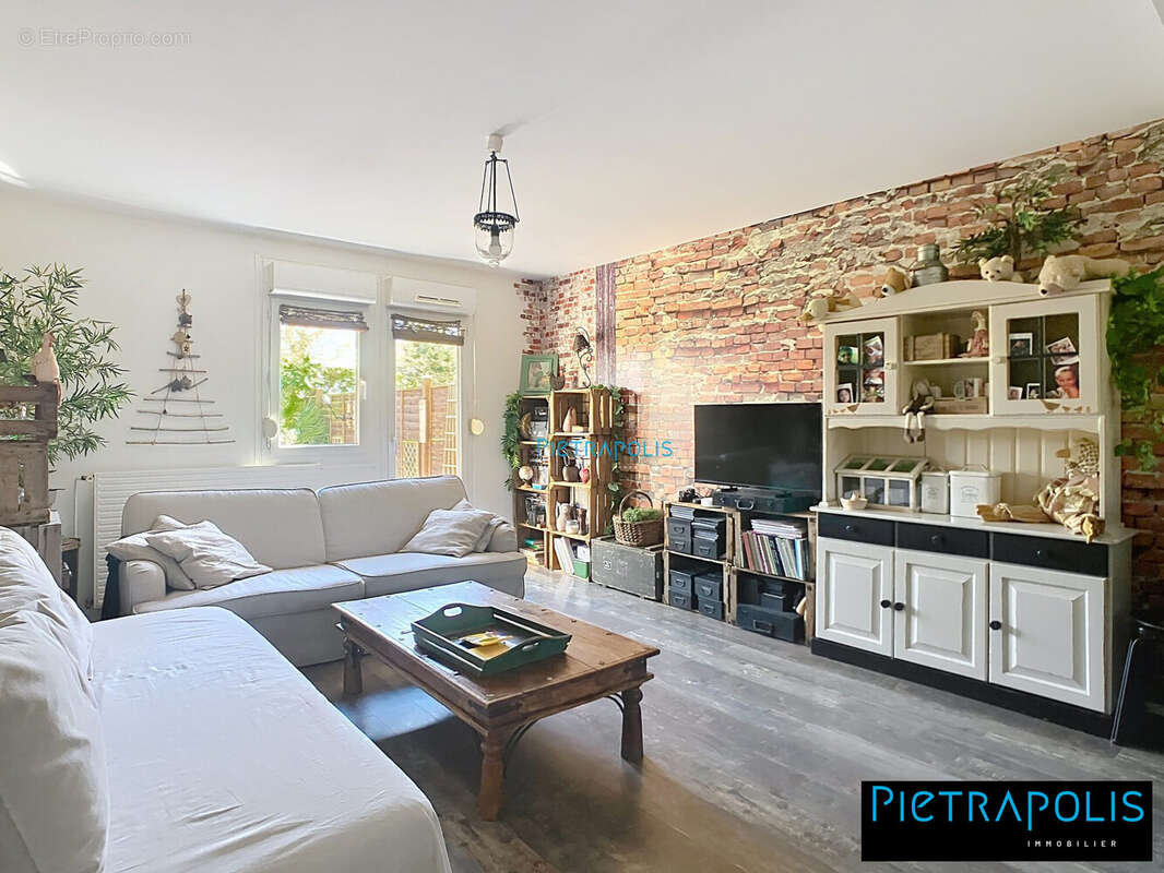 Appartement à SAINT-GEORGES-DE-RENEINS