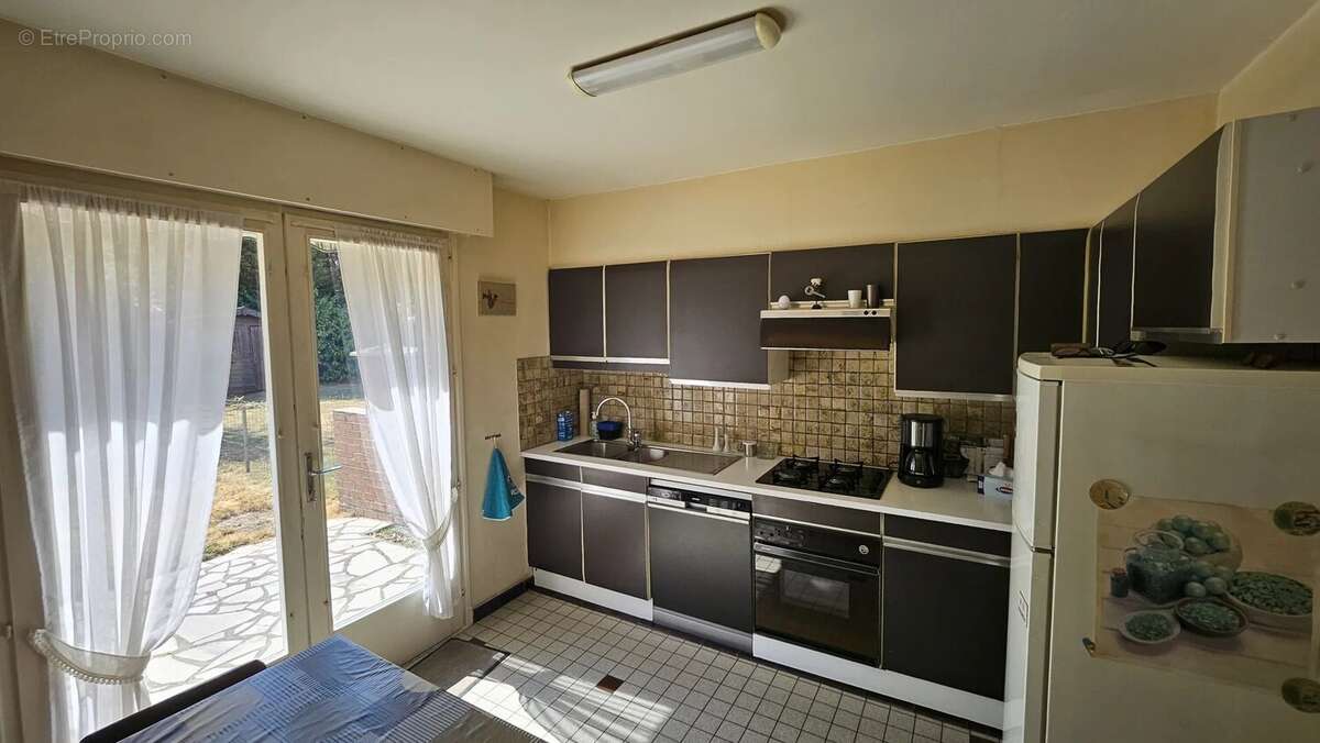 Maison 100 m² à Neuville-En-Ferrain  - photo 4